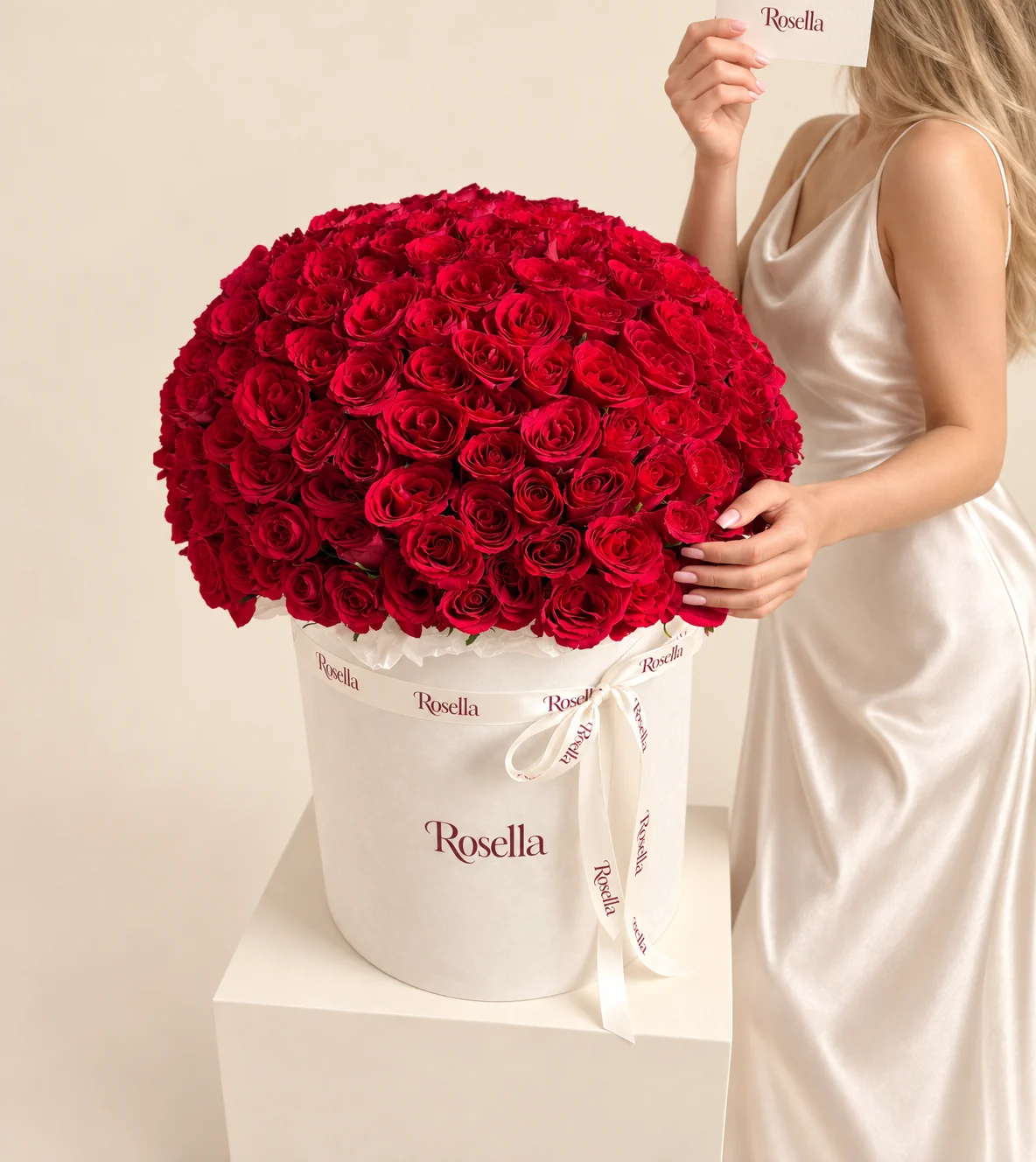 130 roses in a round box