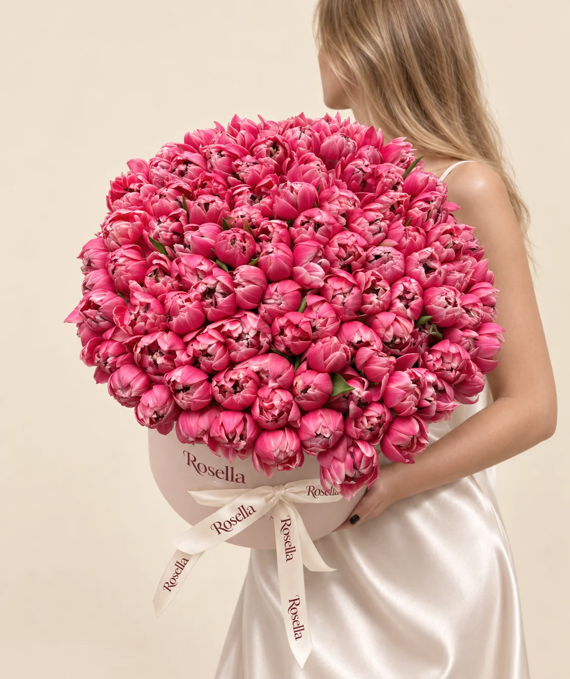 145 tulips in a round box