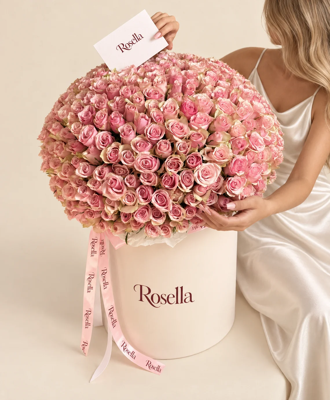235 roses in a round box