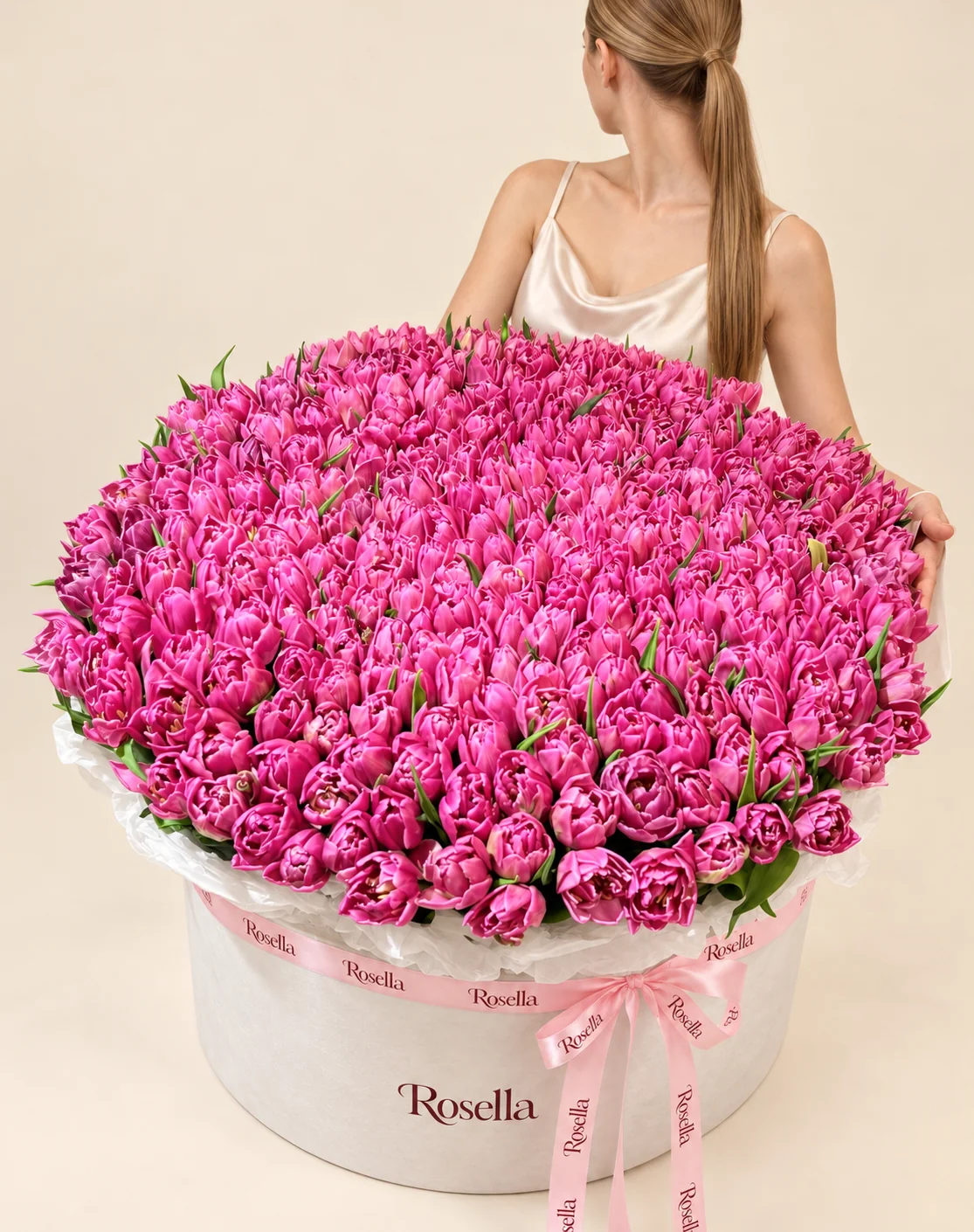 325 tulips in a round box