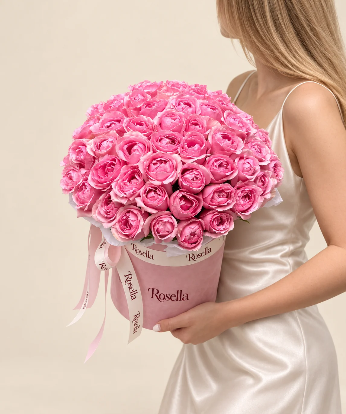 53 roses in a round box
