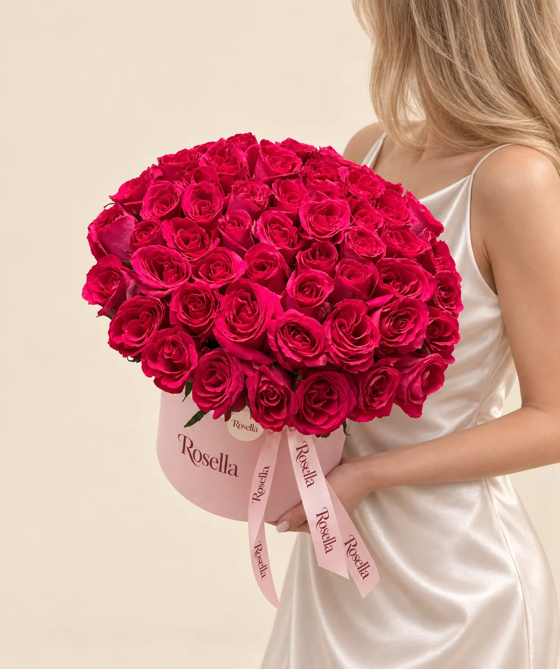 57 roses in a round box