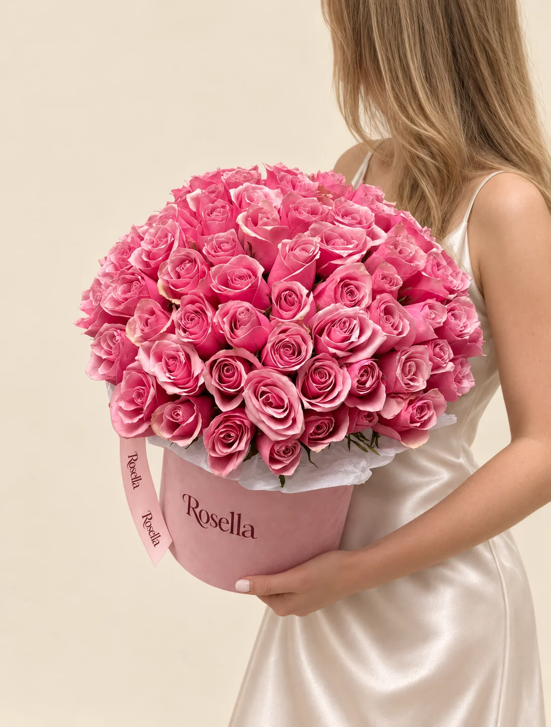 70 roses in a round box