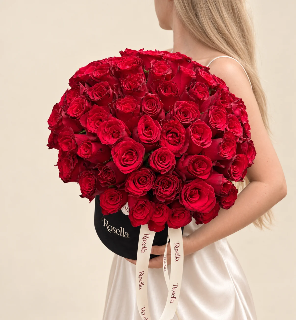 70 roses in a round box