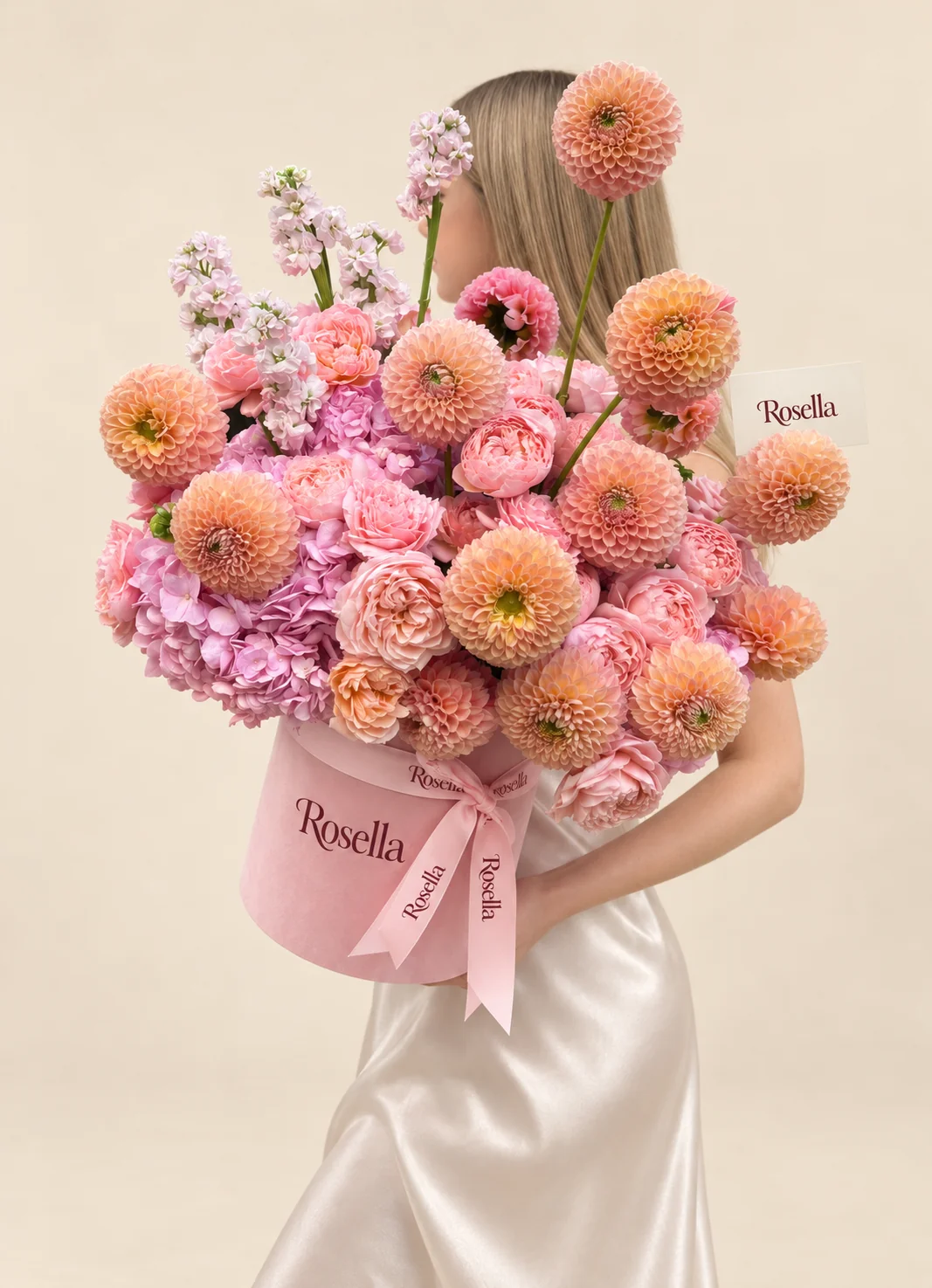 20 pink garden roses, 16 dahlias, 4 hydrangeas, 4 stocks & 3 peach garden roses in a round box
