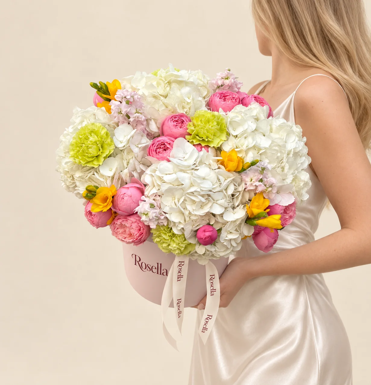 14 pink garden roses, 5 hydrangeas, 2 stocks, 4 carnations, 3 freesias & 1 blush garden rose in a round box