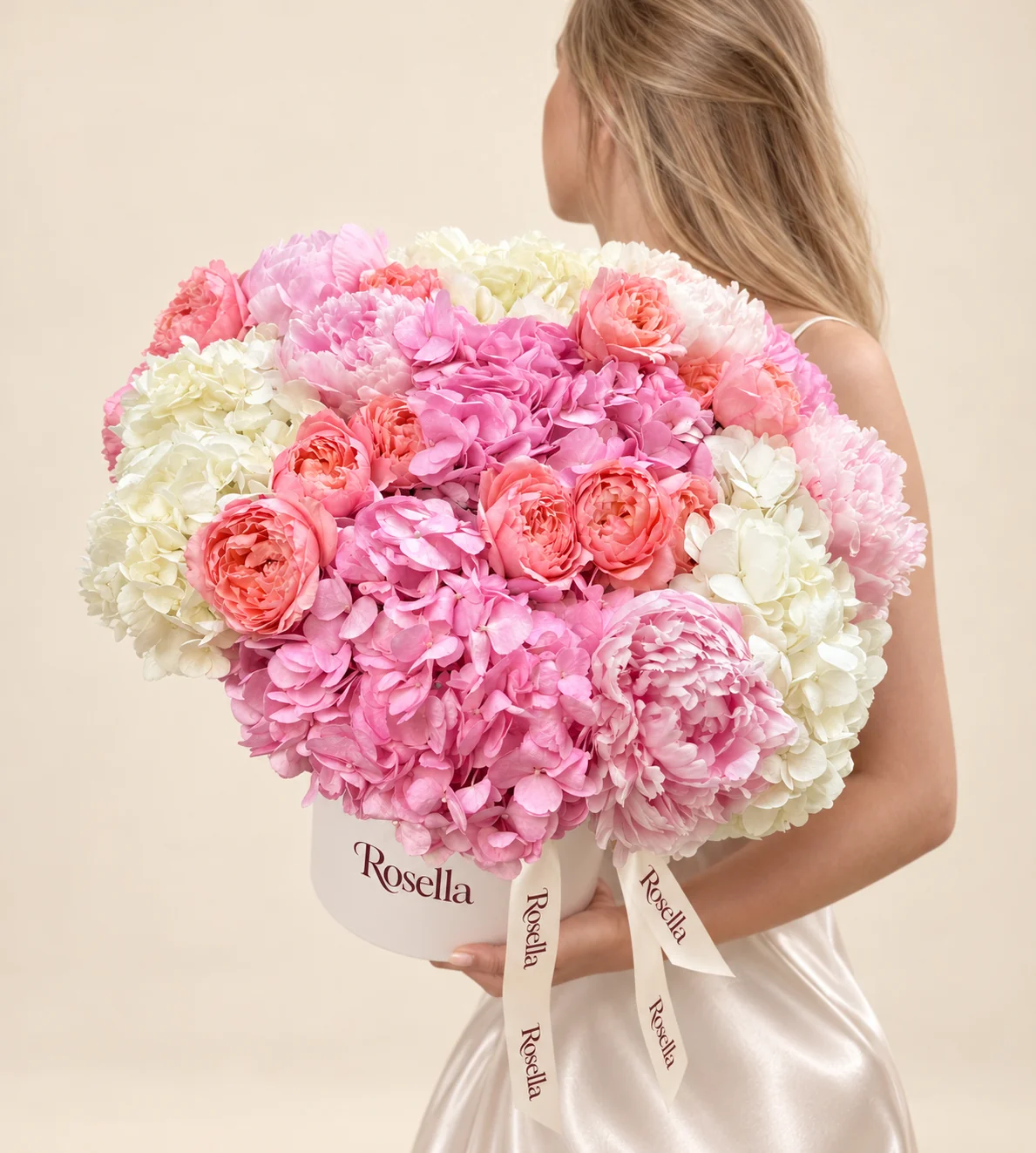 14 garden roses, 5 pink hydrangeas, 5 cream hydrangeas, 6 pink peonies & 4 white peonies in a round box