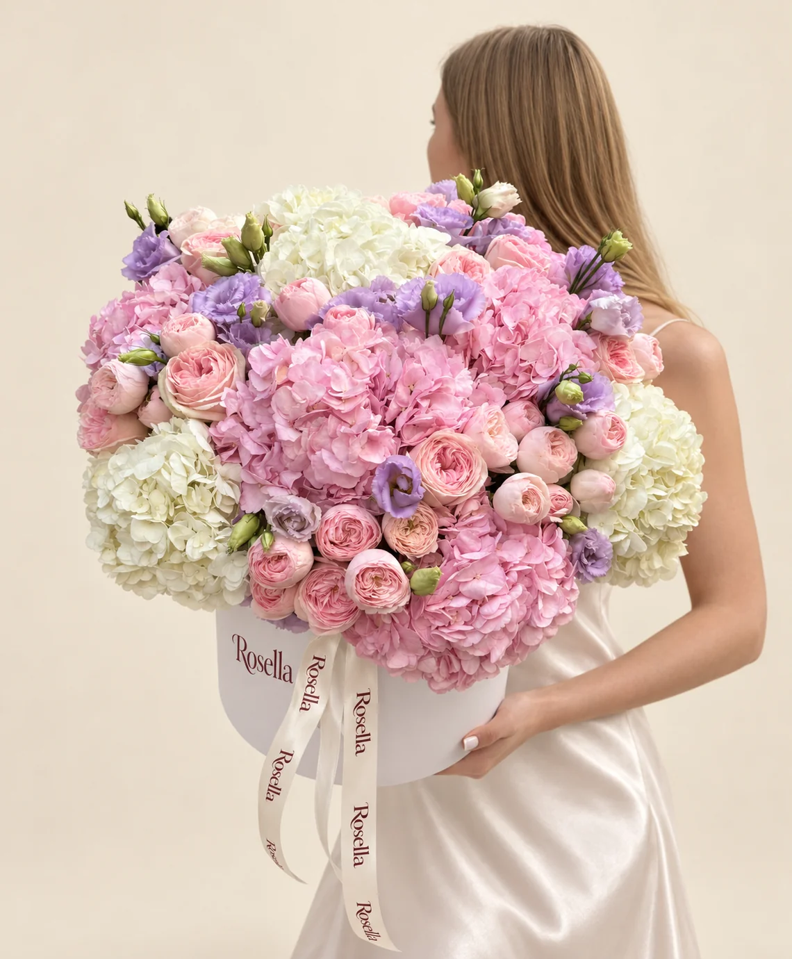 33 garden roses, 6 pink hydrangeas, 4 white hydrangeas, 18 lavender lisianthus blooms & 2 white lisianthus blooms in a round box