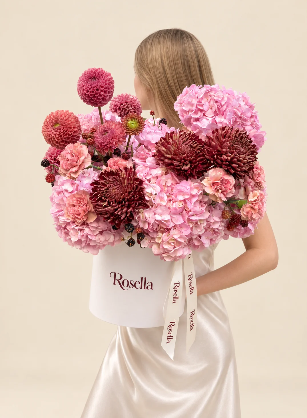 7 hydrangeas, 5 pink dahlias, 8 carnations, 3 chrysanthemums & 1 coral dahlia in a round box