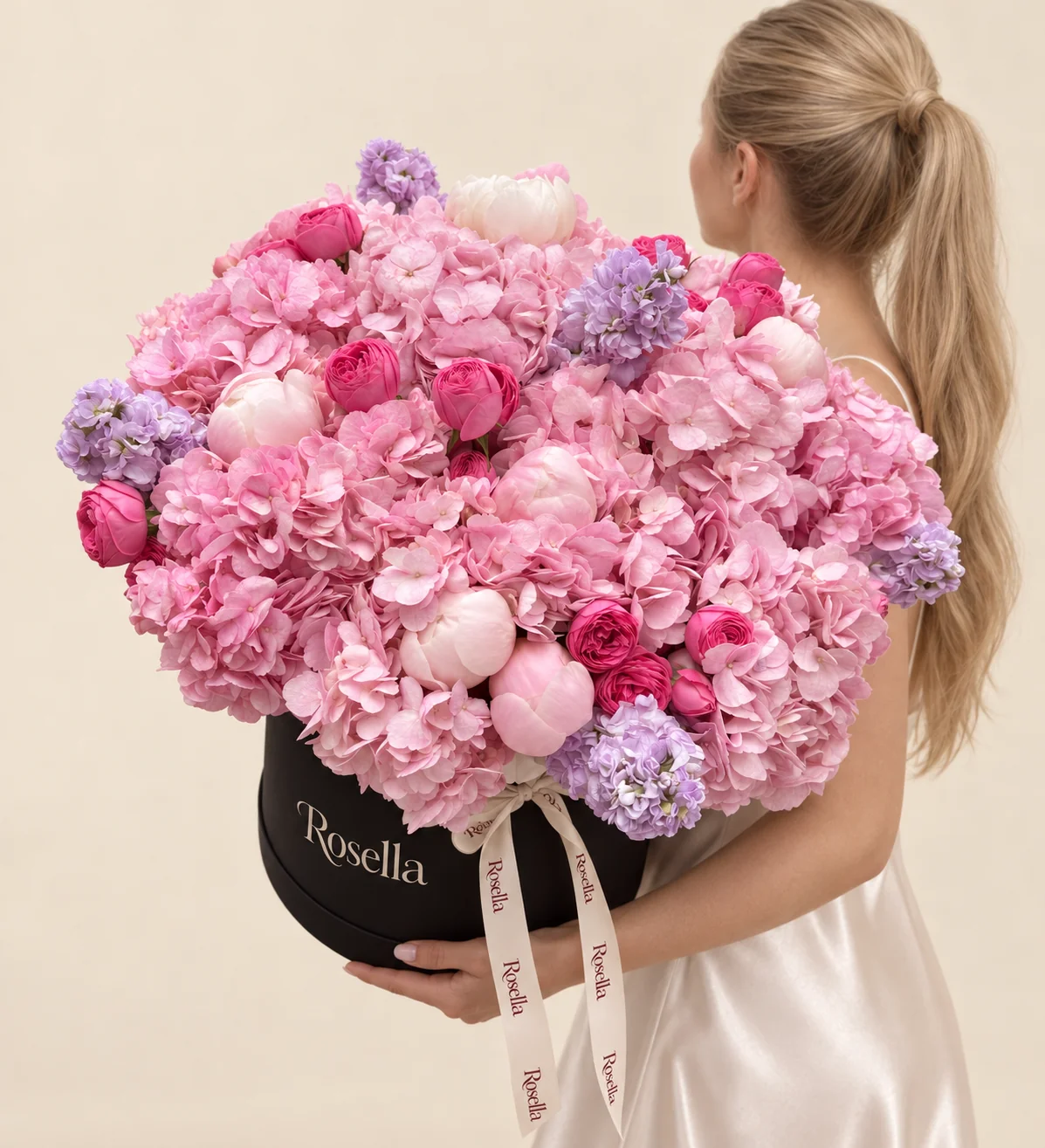 13 hydrangeas, 17 garden roses, 8 peonies & 6 stocks in a round box