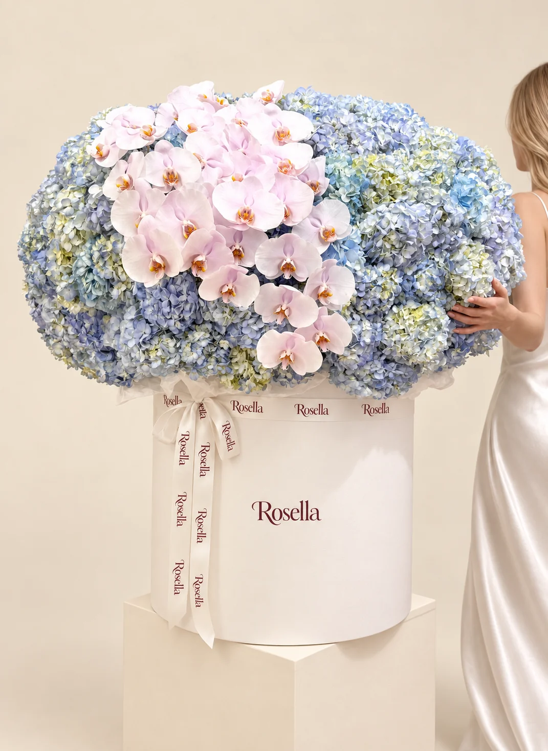 52 hydrangeas & 32 orchid blooms in a round box