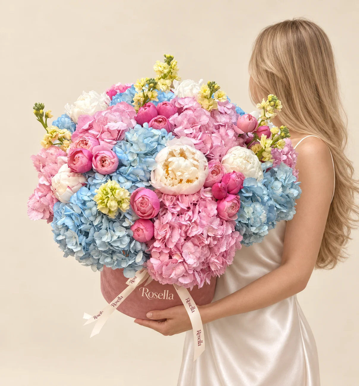 10 blue hydrangeas, 10 pink hydrangeas, 17 pink peonies, 7 white peonies & 4 stocks in a round box