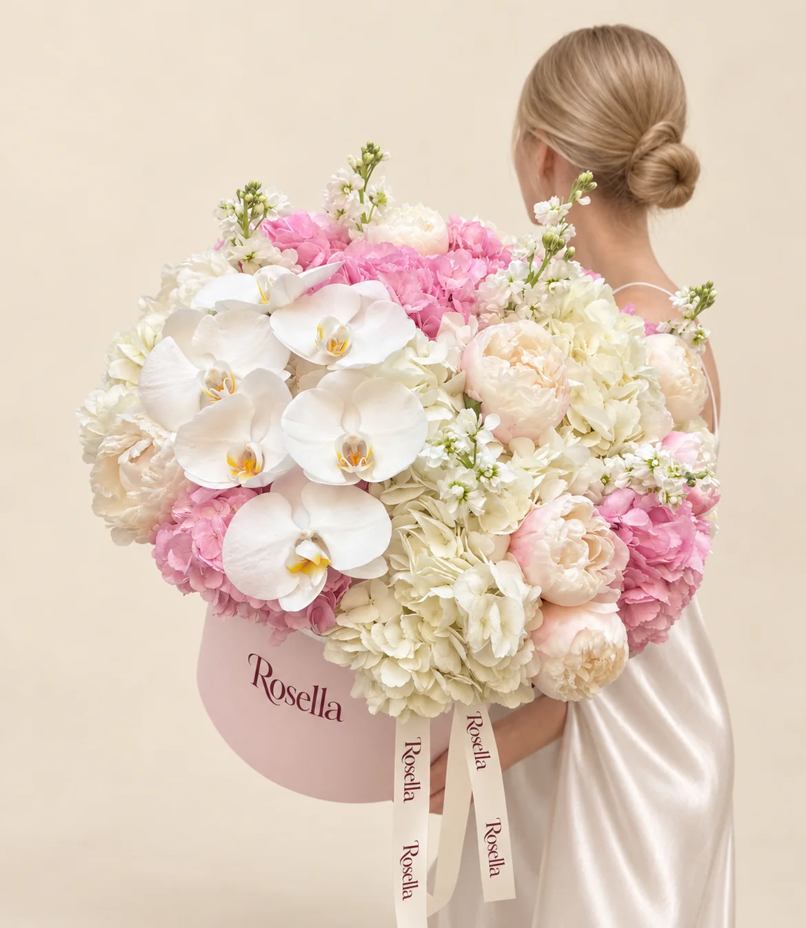 8 white hydrangeas, 6 pink hydrangeas, 9 peonies, 3 stocks & 6 orchid blooms in a round box