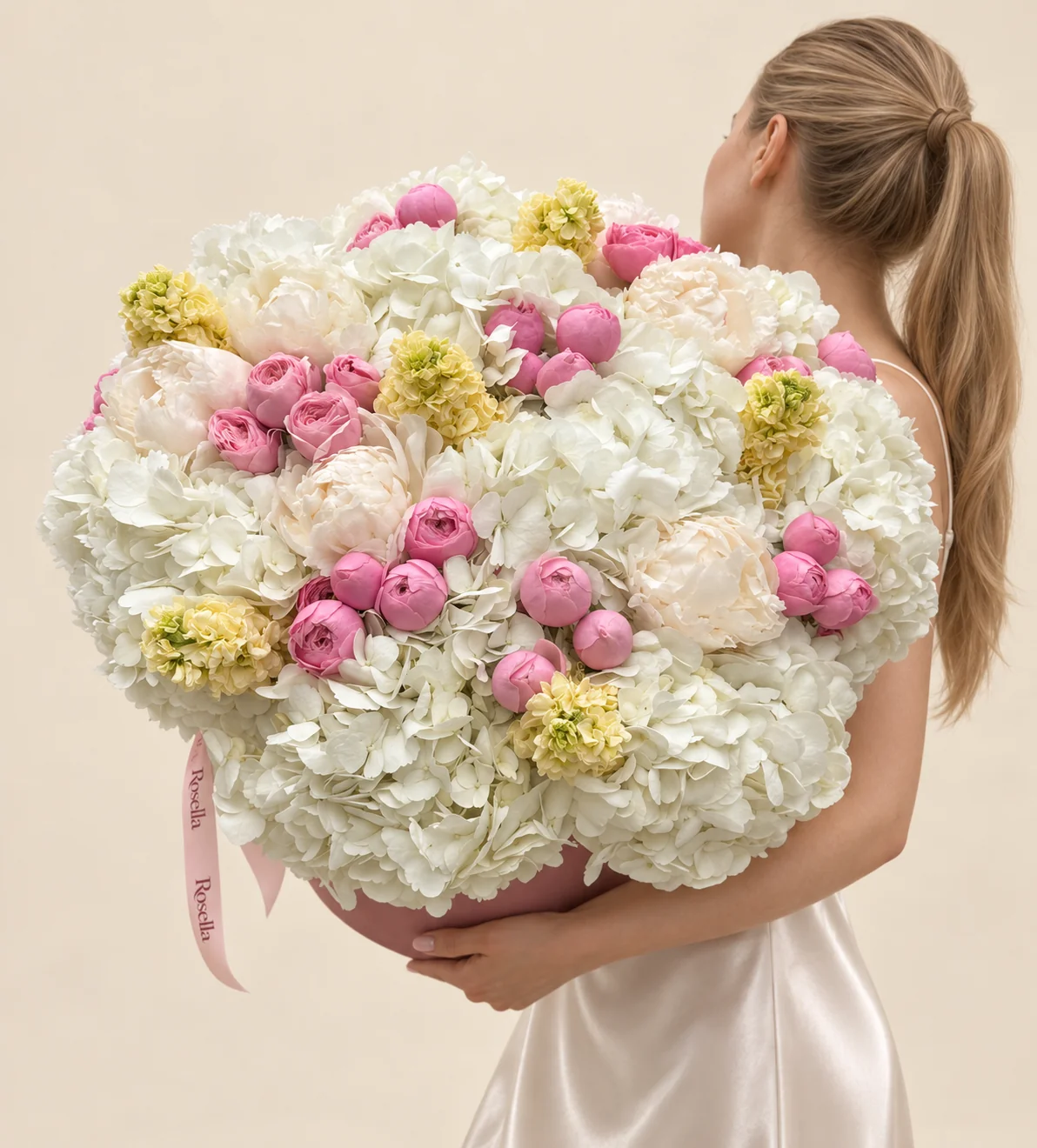 15 hydrangeas, 33 spray roses, 6 peonies & 6 stocks in a round box