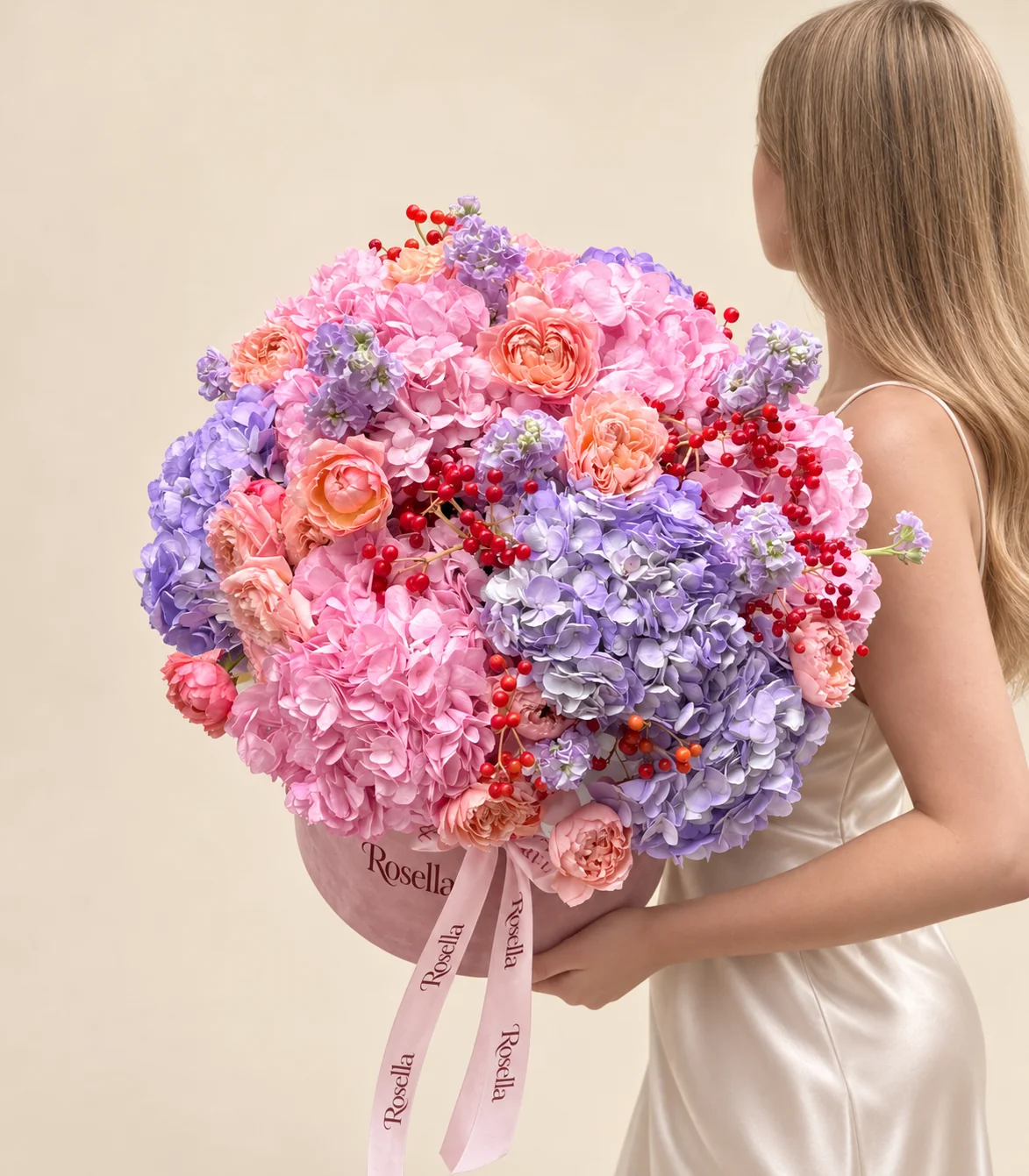 8 pink hydrangeas, 5 lavender hydrangeas, 5 stocks & 18 spray roses in a round box