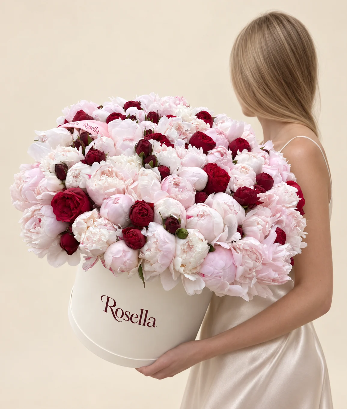 65 peonies & 38 garden roses in a round box