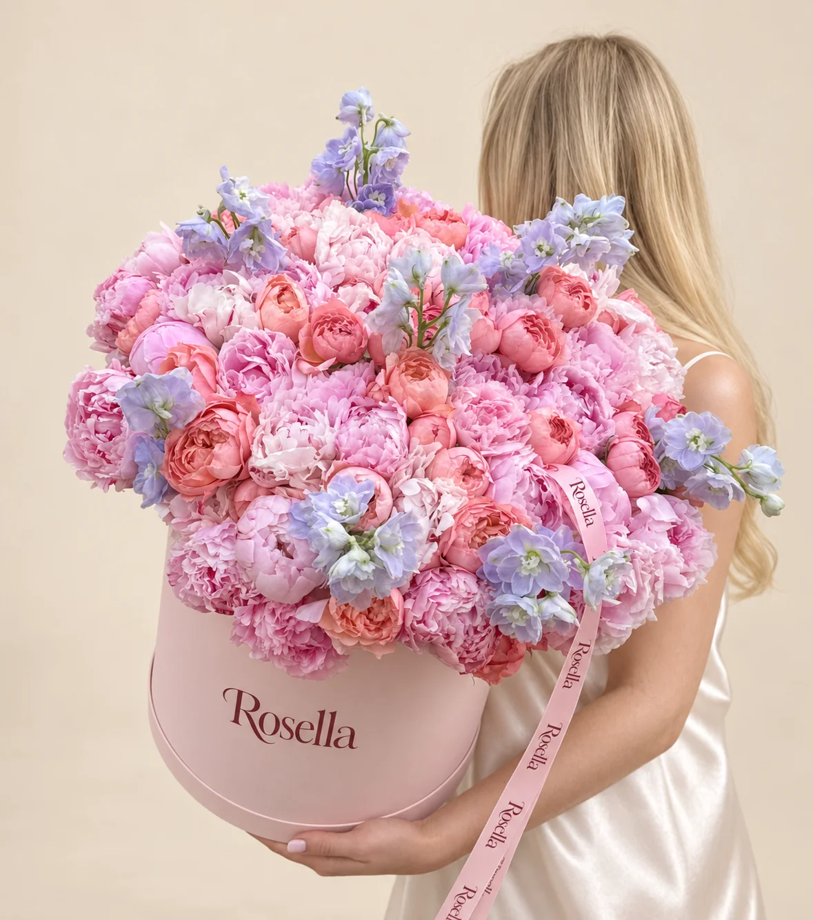 37 peonies, 27 garden roses & 3 delphiniums in a round box