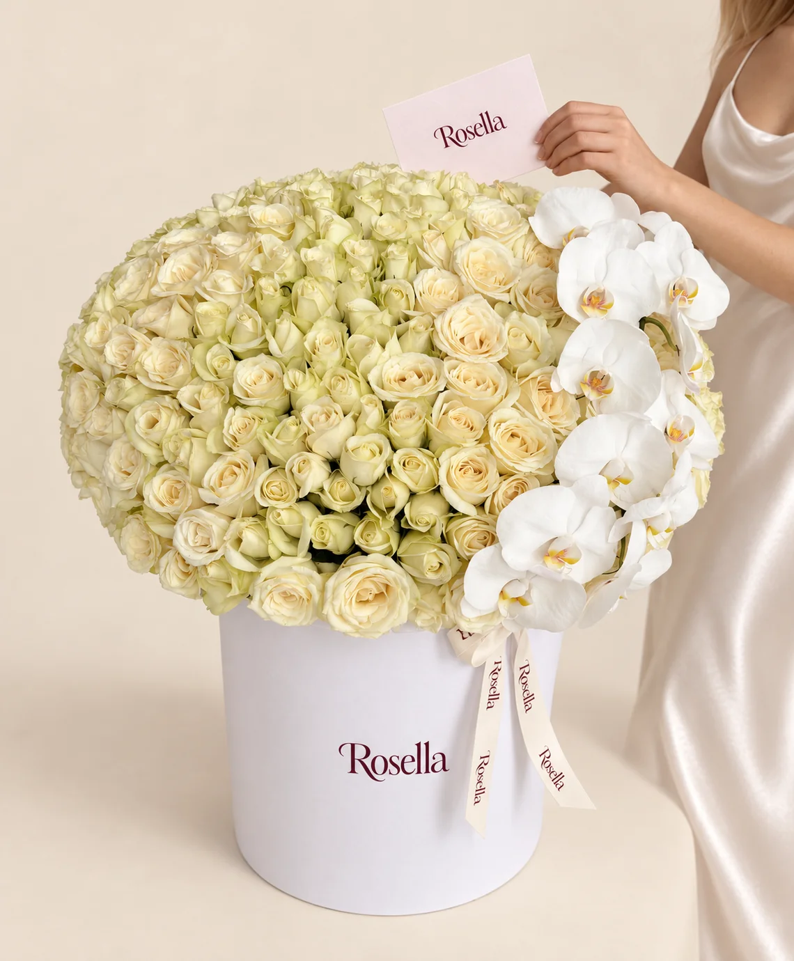 170 roses & 11 orchid blooms in a round box