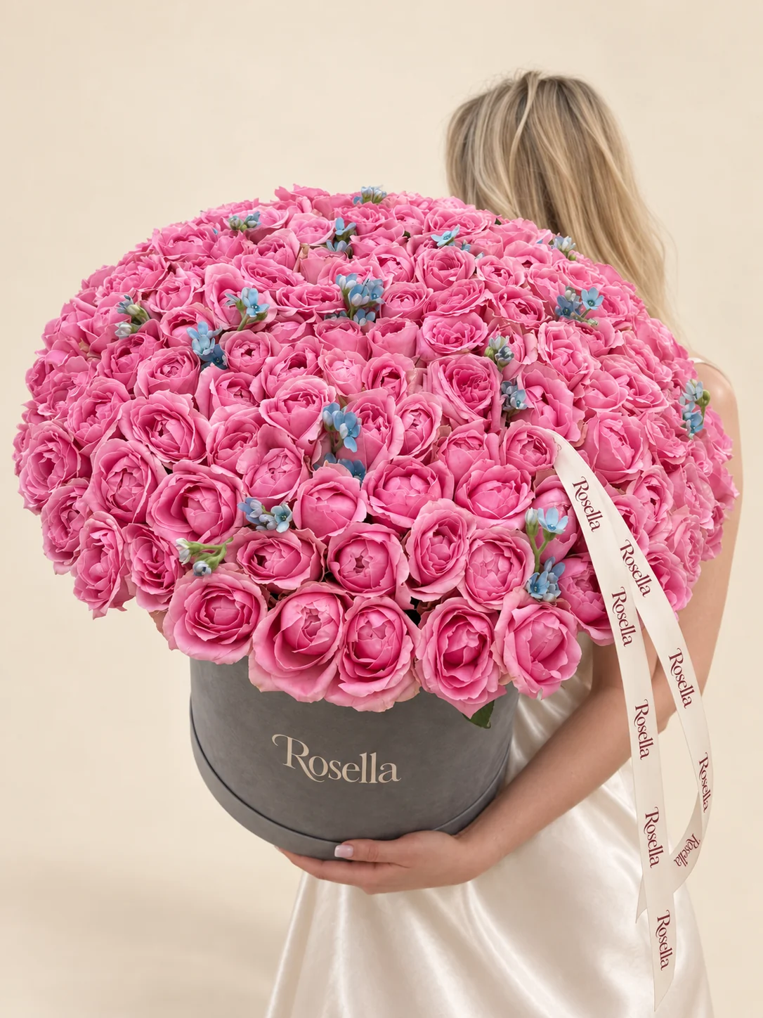 130 roses & 48 tweedia blooms in a round box