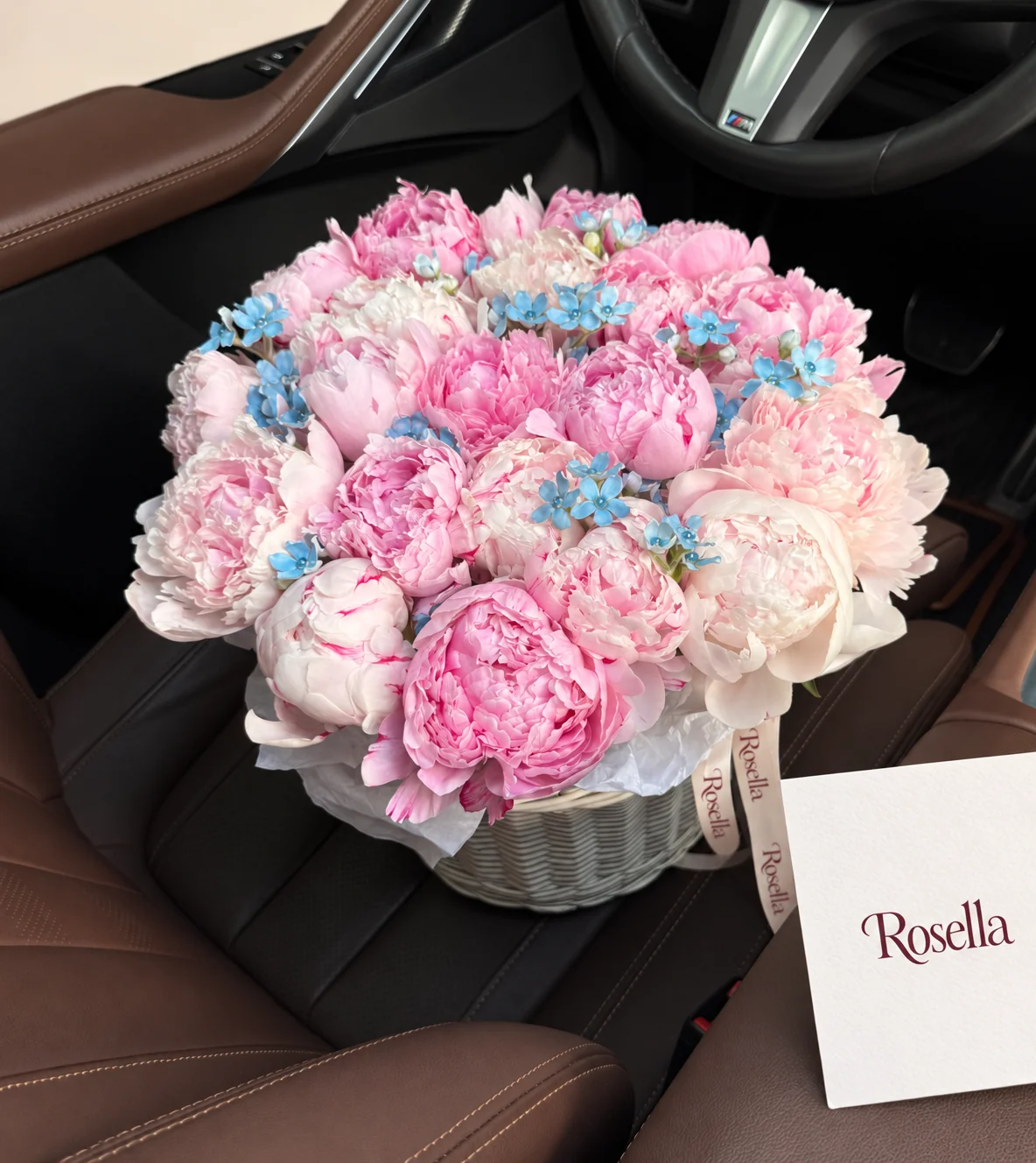 25 peonies & 34 tweedia blooms in a basket