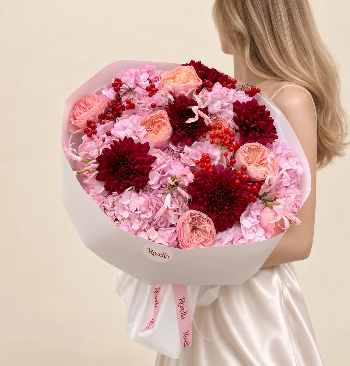 7 hydrangeas, 8 garden roses, 6 chrysanthemums & 12 pale pink nerine in a hand-tied bouquet