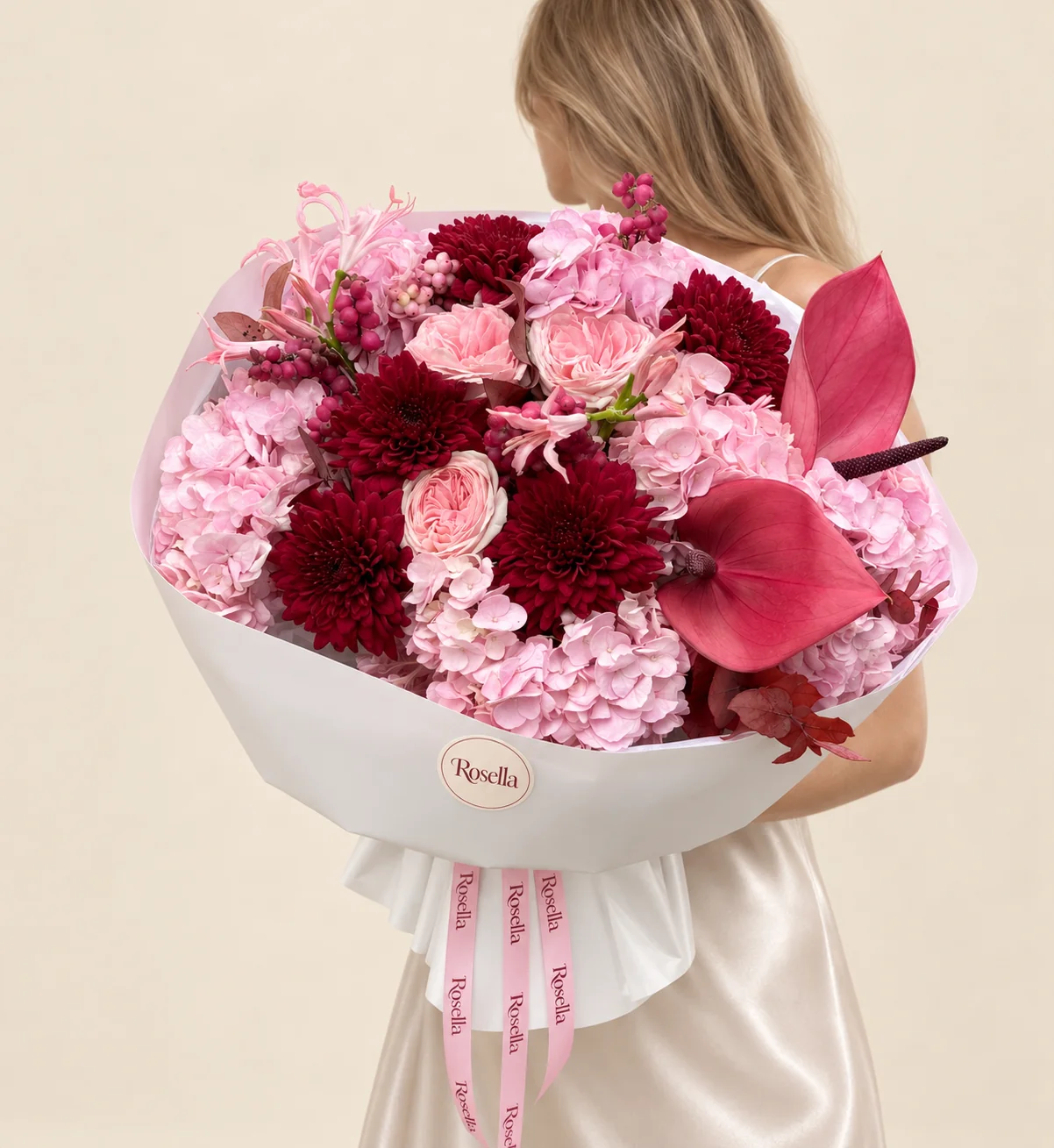 7 hydrangeas, 5 garden roses, 6 chrysanthemums, 12 pink nerine & 2 anthuriums in a hand-tied bouquet
