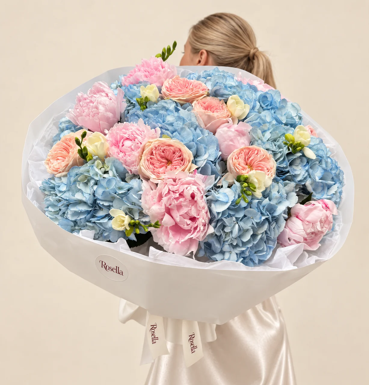 8 hydrangeas, 8 peonies, 7 garden roses & 3 freesias in a hand-tied bouquet