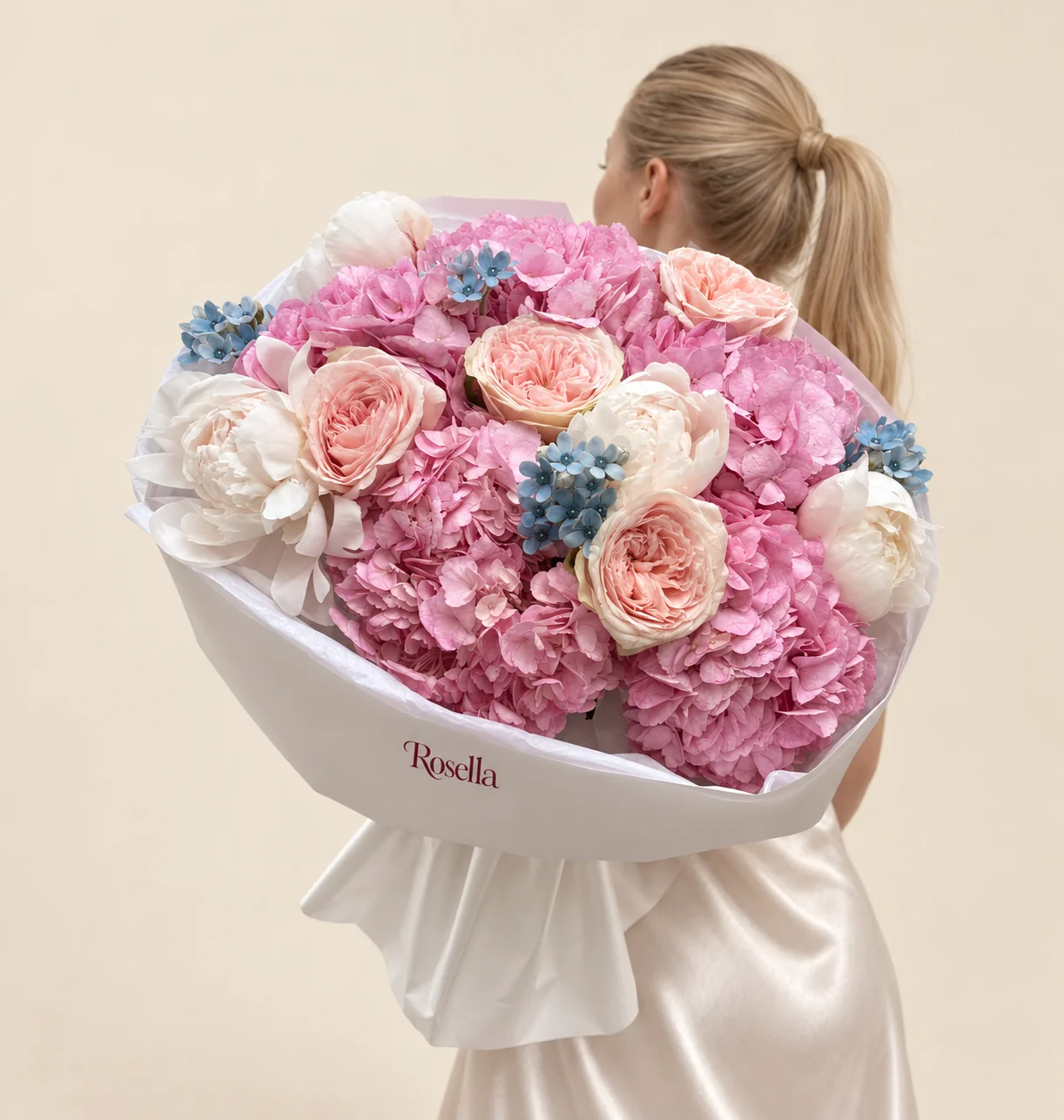 6 hydrangeas, 4 peonies, 4 garden roses & 28 tweedia blooms in a hand-tied bouquet