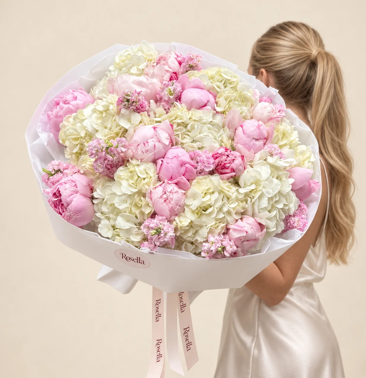 10 hydrangeas, 16 peonies & 7 stocks in a hand-tied bouquet