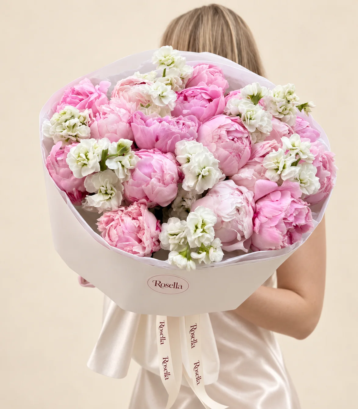 18 peonies & 4 stocks in a hand-tied bouquet