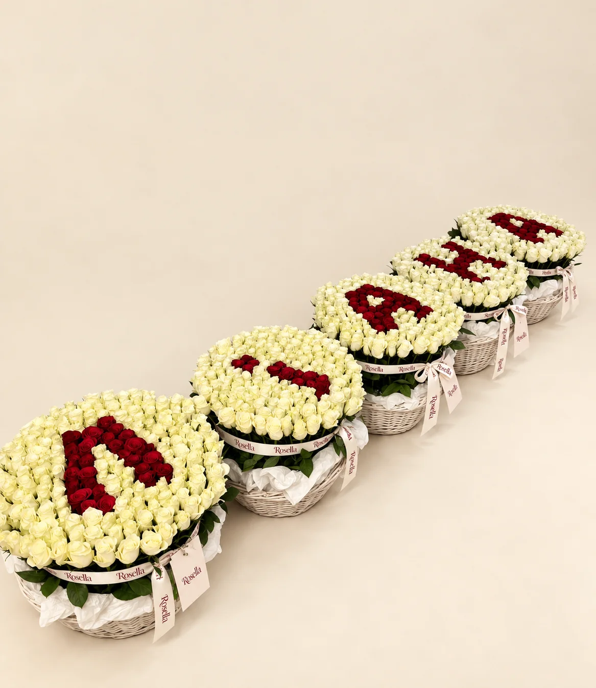 580 cream roses & 130 red roses in a basket