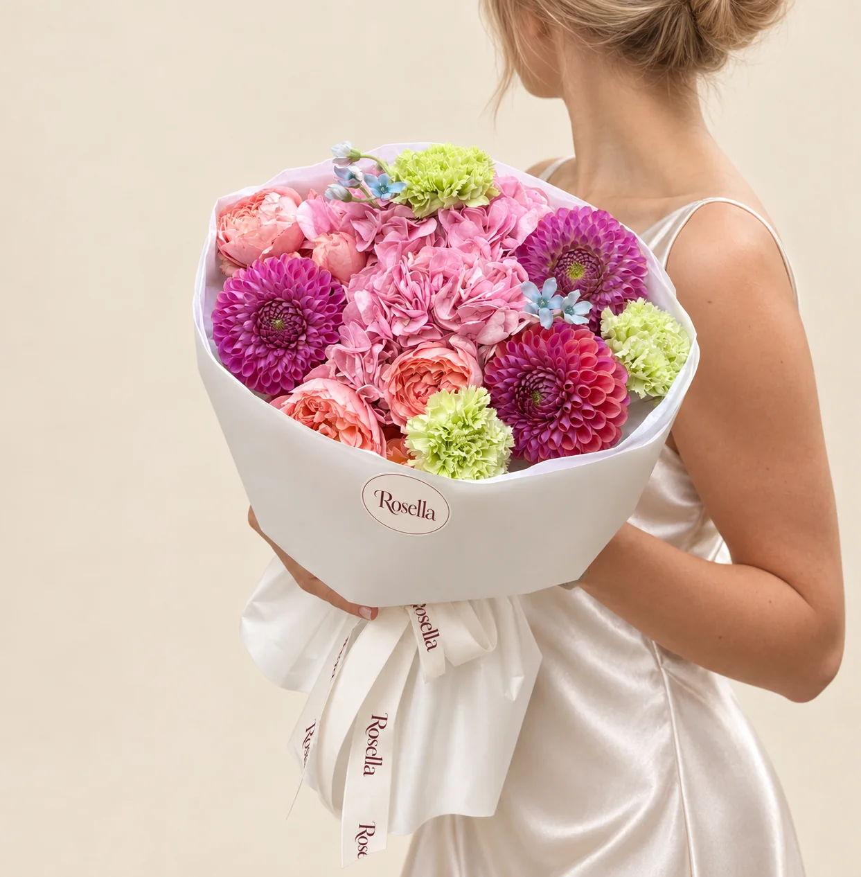 5 garden roses, 3 dahlias, 1 hydrangea, 3 carnations & 5 tweedia blooms in a hand-tied bouquet