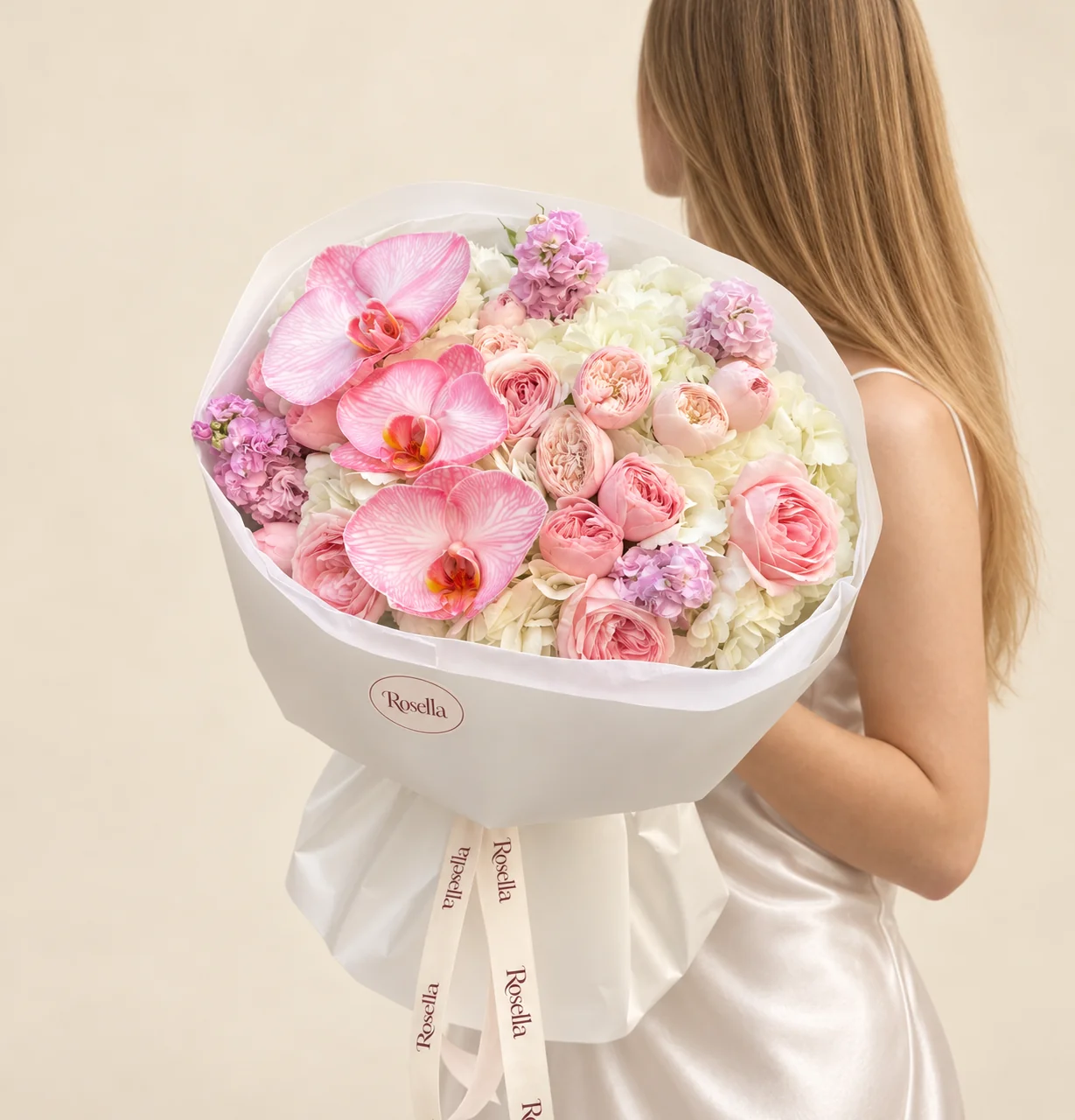17 garden roses, 6 hydrangeas, 3 stocks & 3 orchid blooms in a hand-tied bouquet