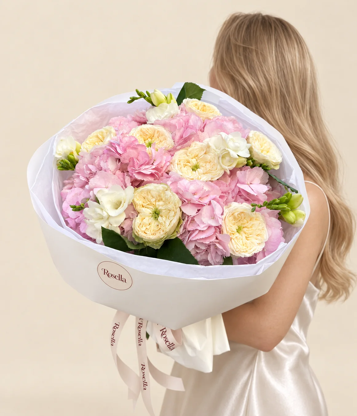 8 garden roses, 3 hydrangeas & 3 freesias in a hand-tied bouquet