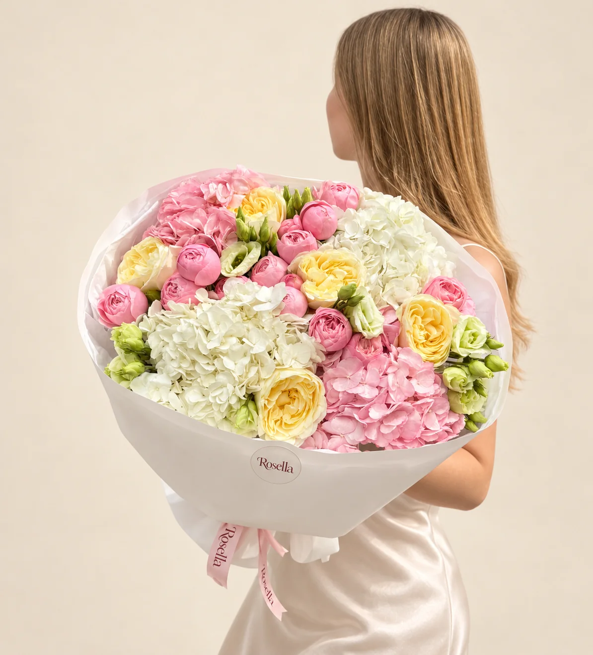 6 garden roses, 2 white hydrangeas, 2 pink hydrangeas, 18 spray roses & 12 lisianthus blooms in a hand-tied bouquet