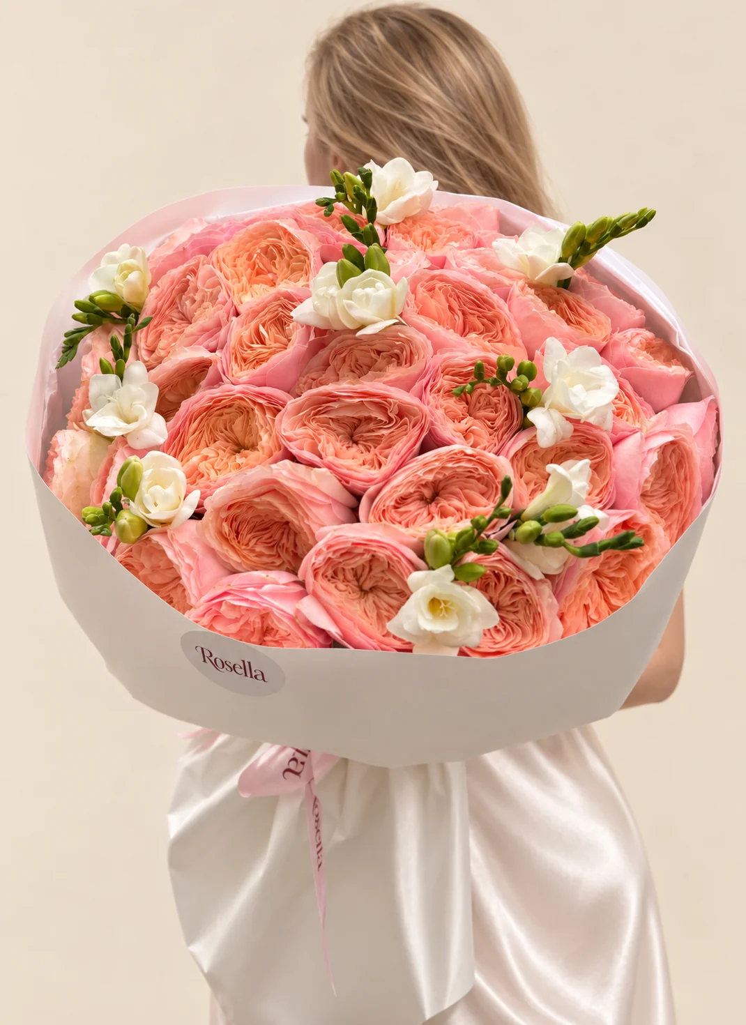 30 garden roses & 4 freesias in a hand-tied bouquet