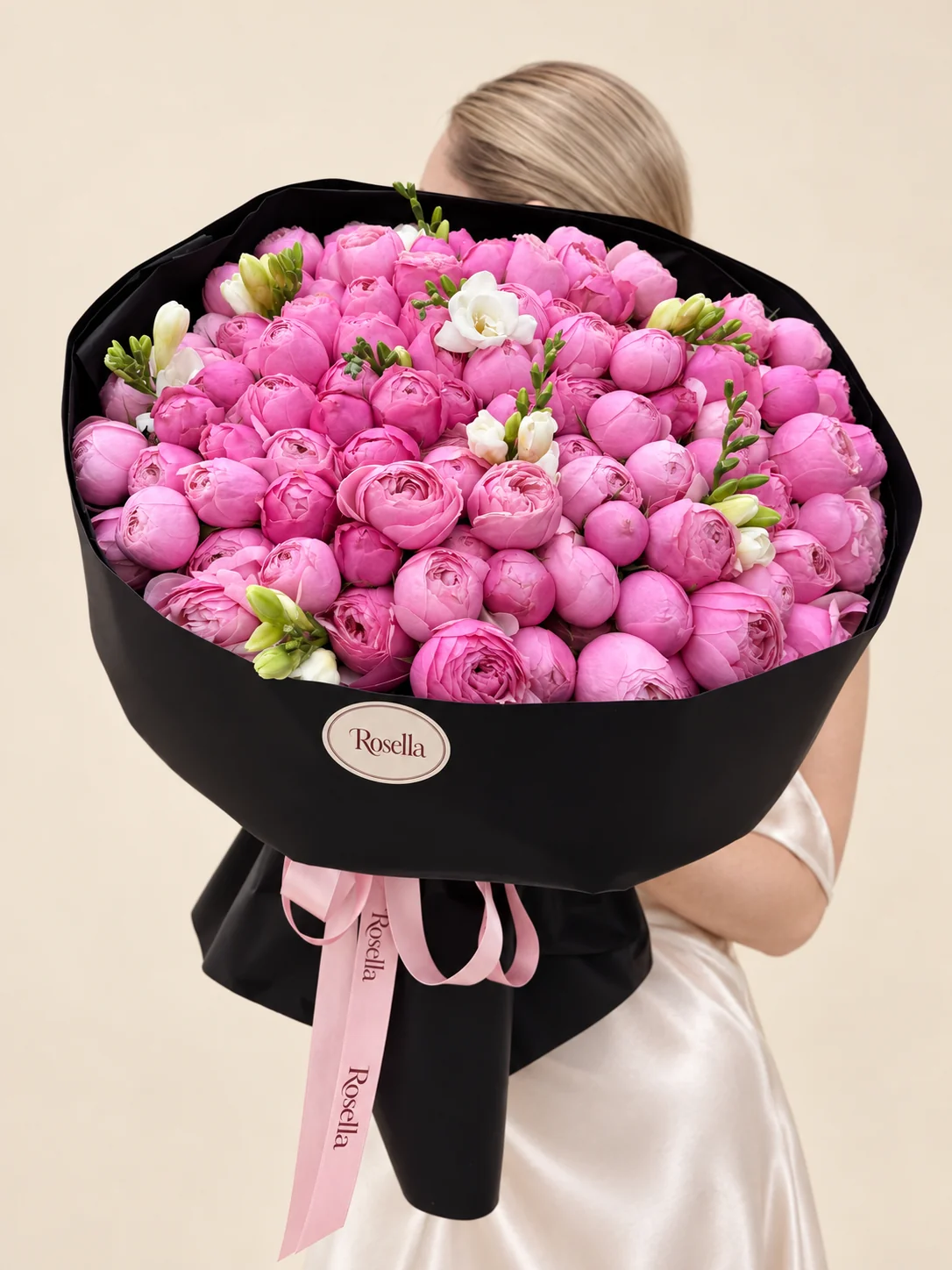 100 garden roses & 4 freesias in a hand-tied bouquet