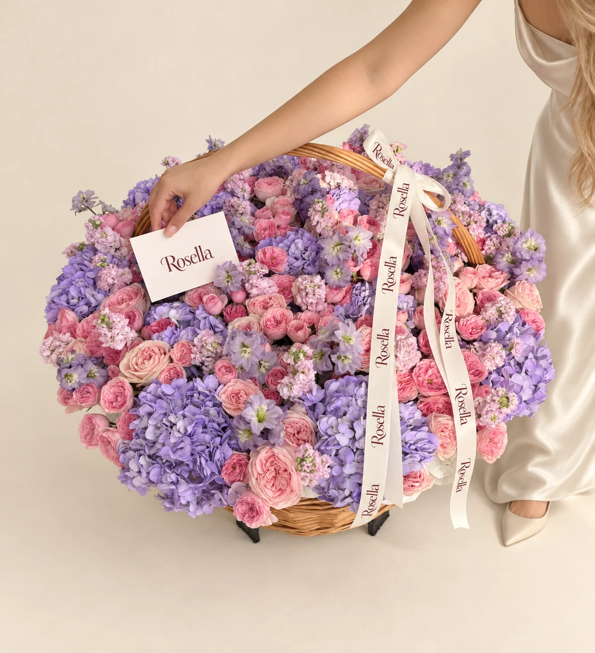 15 hydrangeas, 23 garden roses, 80 spray roses, 11 stocks & 3 delphiniums in a basket