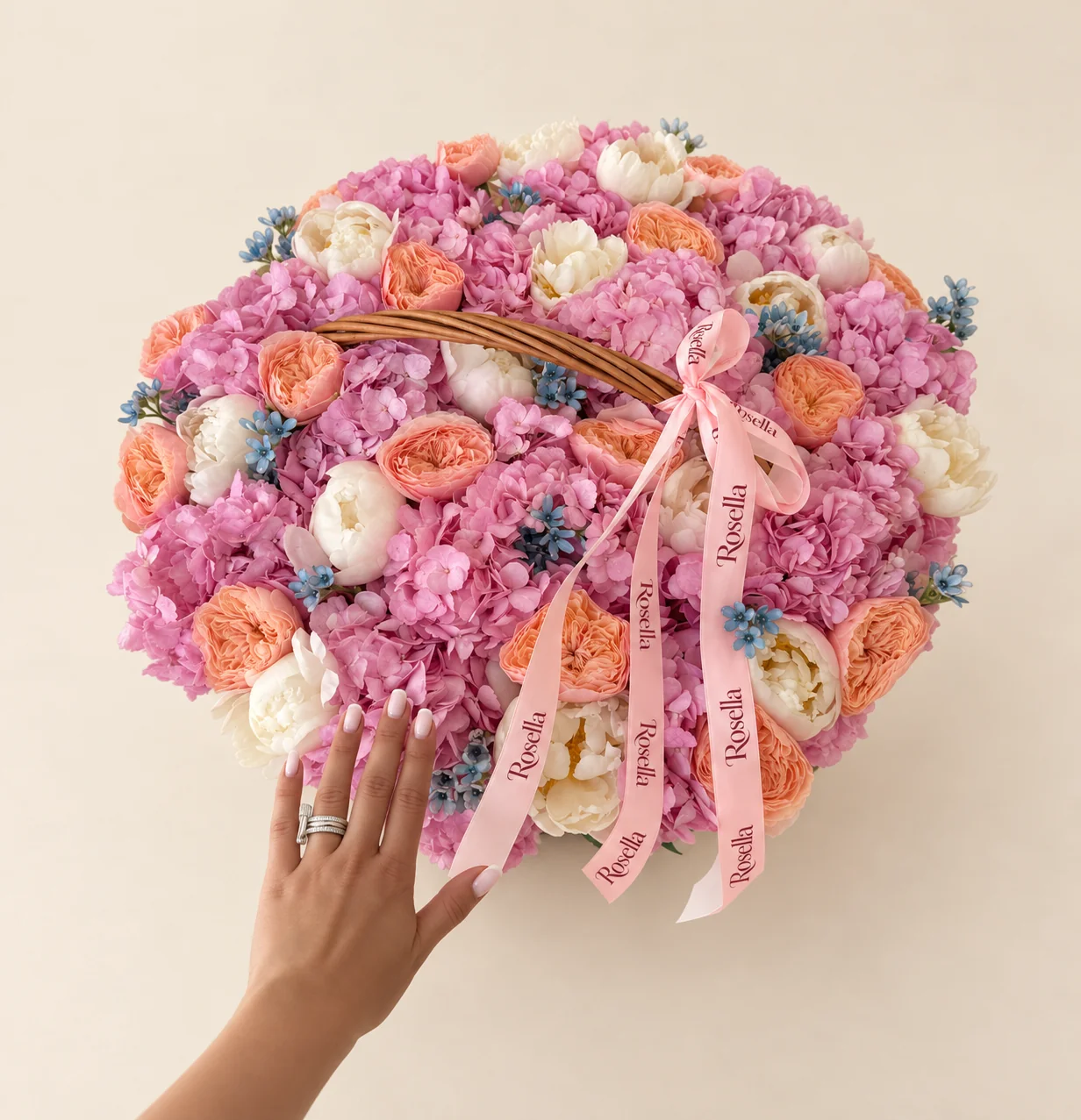 17 hydrangeas, 17 peonies, 19 garden roses & 90 tweedia blooms in a basket