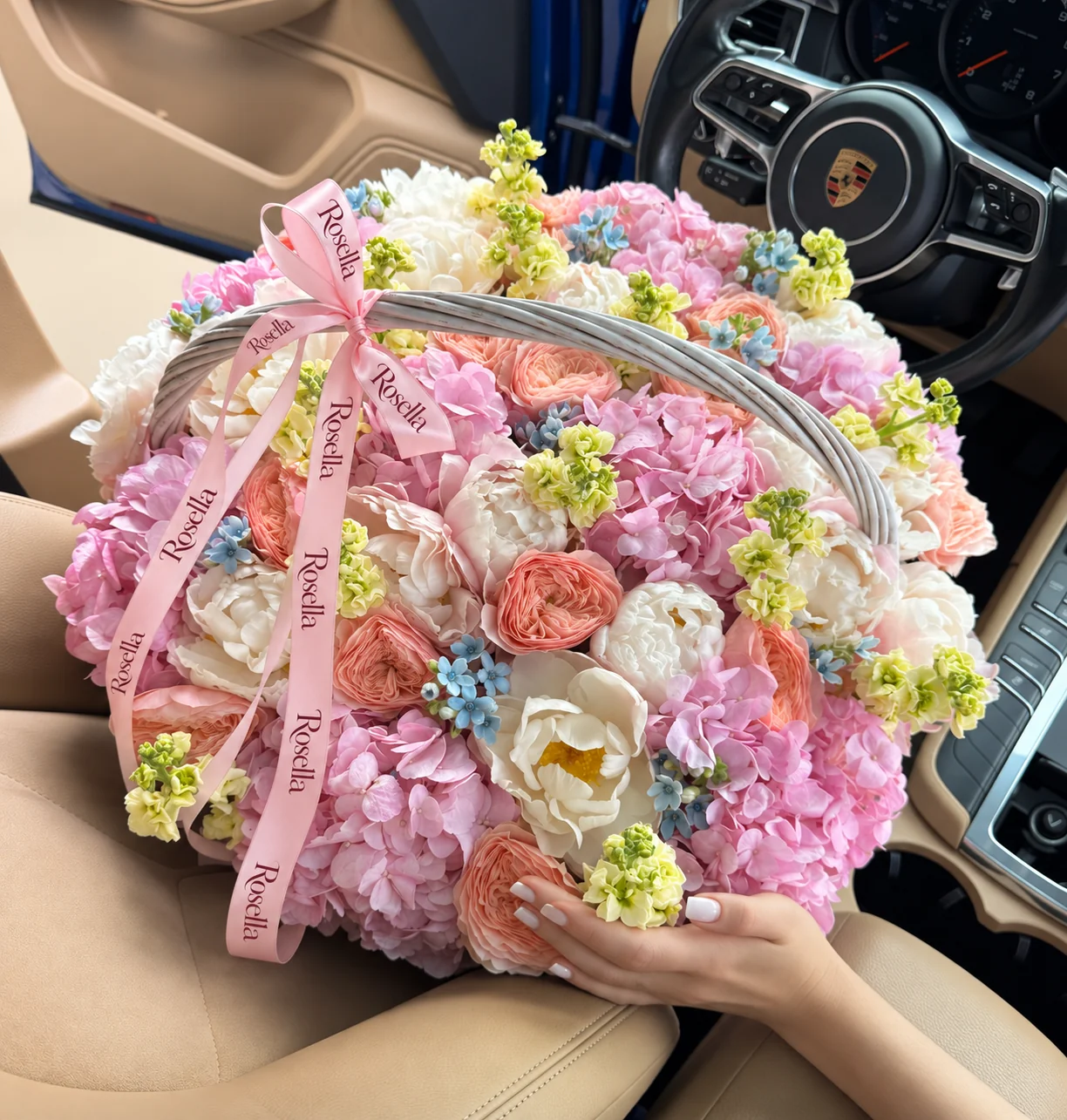 10 hydrangeas, 18 peonies, 15 garden roses, 7 stocks & 52 tweedia blooms in a basket