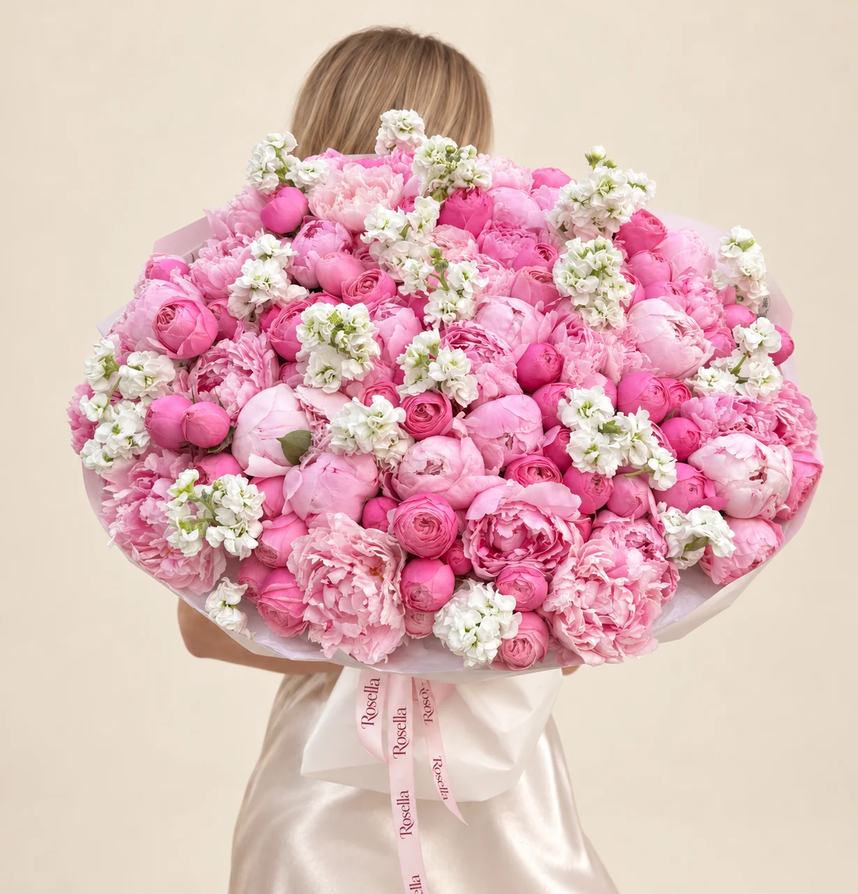 95 peonies & 14 stocks in a hand-tied bouquet