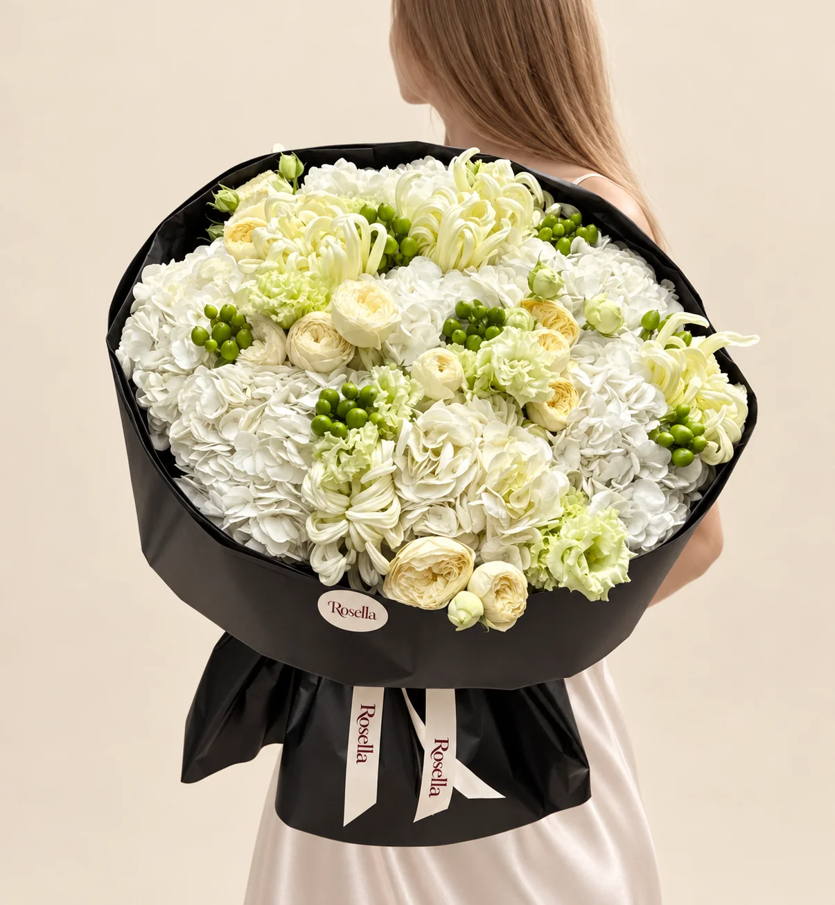 7 hydrangeas, 9 chrysanthemums, 22 spray roses & 7 carnations in a hand-tied bouquet