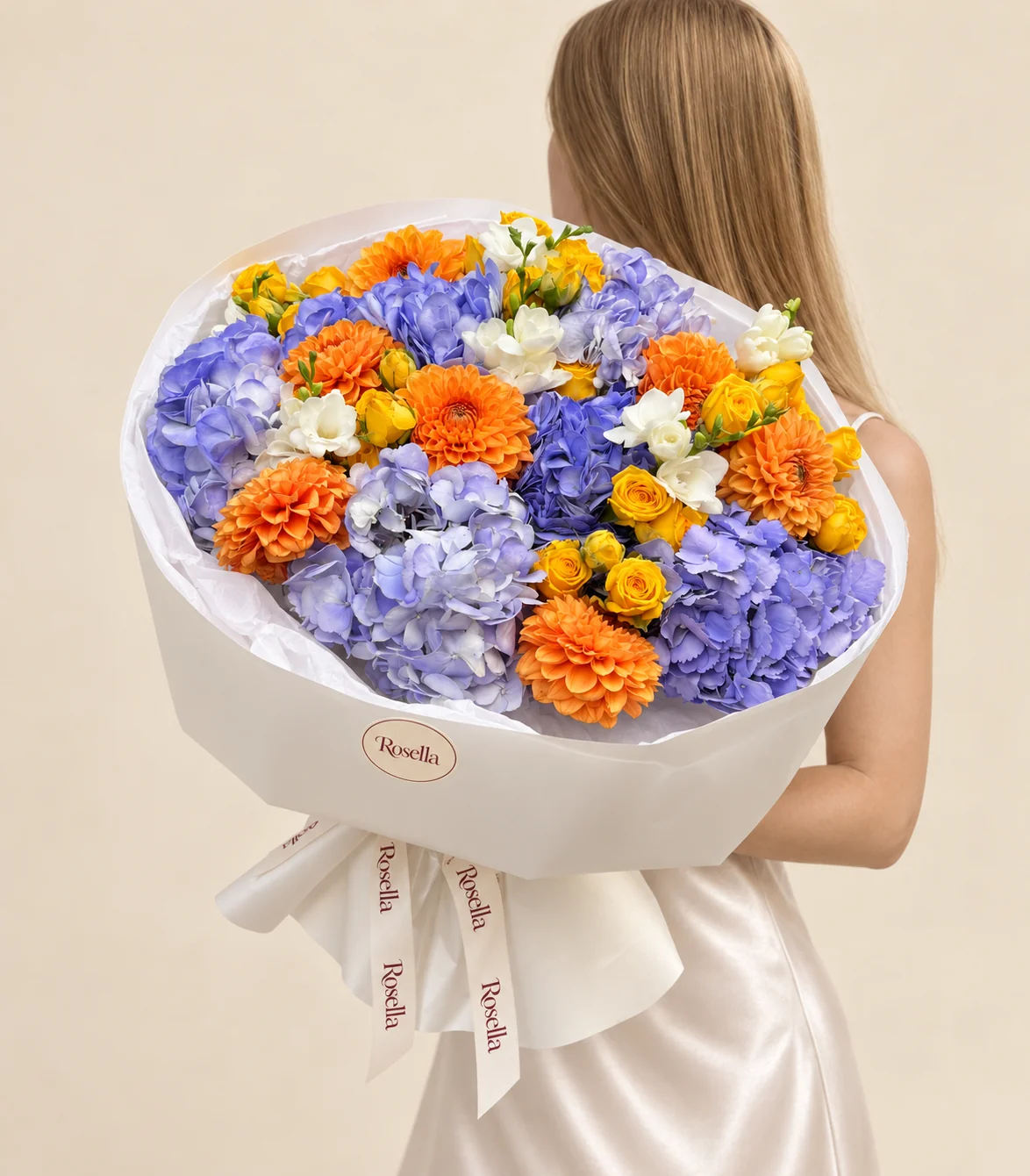 6 hydrangeas, 8 dahlias, 27 spray roses & 5 freesias in a hand-tied bouquet