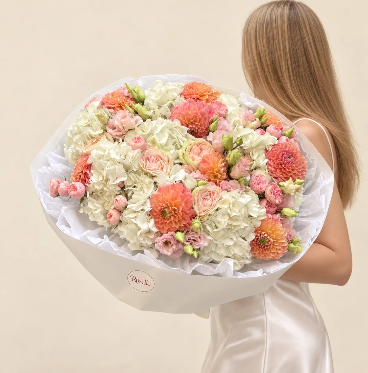 10 hydrangeas, 11 dahlias, 20 spray roses, 5 garden roses & 18 lisianthus blooms in a hand-tied bouquet