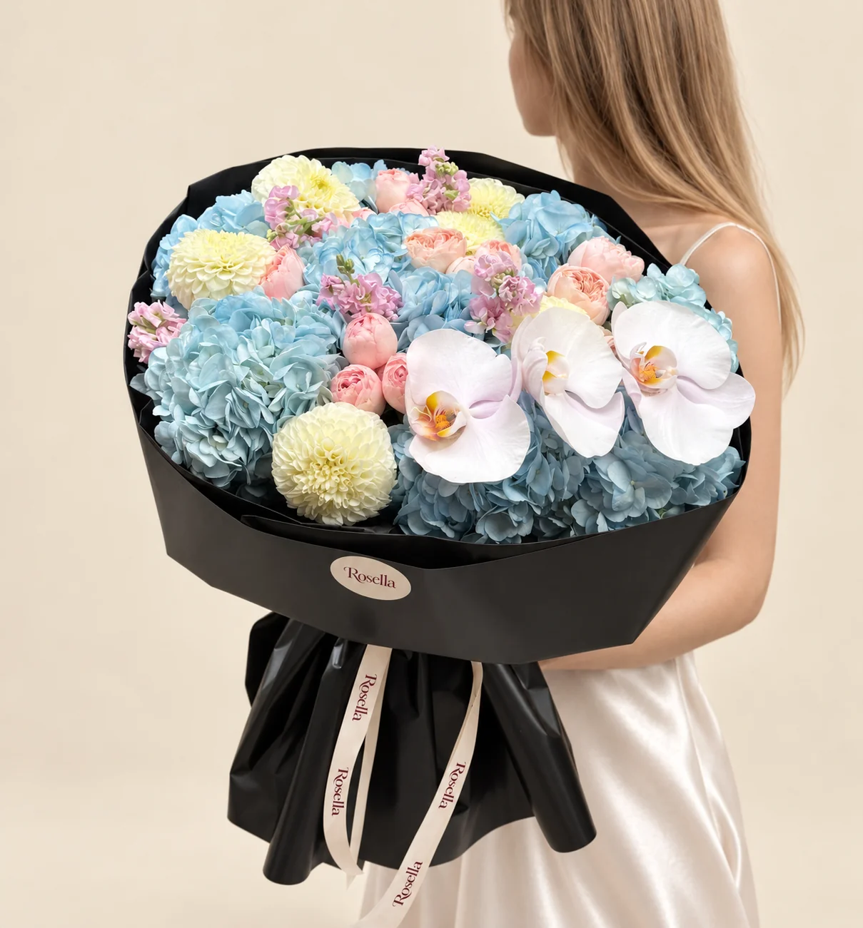 9 hydrangeas, 13 garden roses, 7 dahlias, 3 stocks & 3 orchid blooms in a hand-tied bouquet