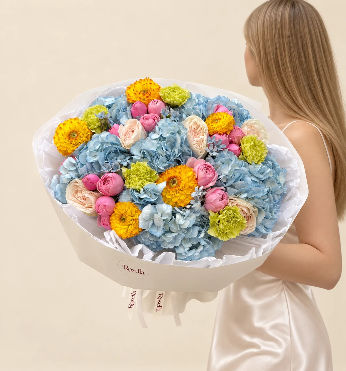 7 hydrangeas, 6 garden roses, 5 dahlias, 17 spray roses & 5 carnations in a hand-tied bouquet