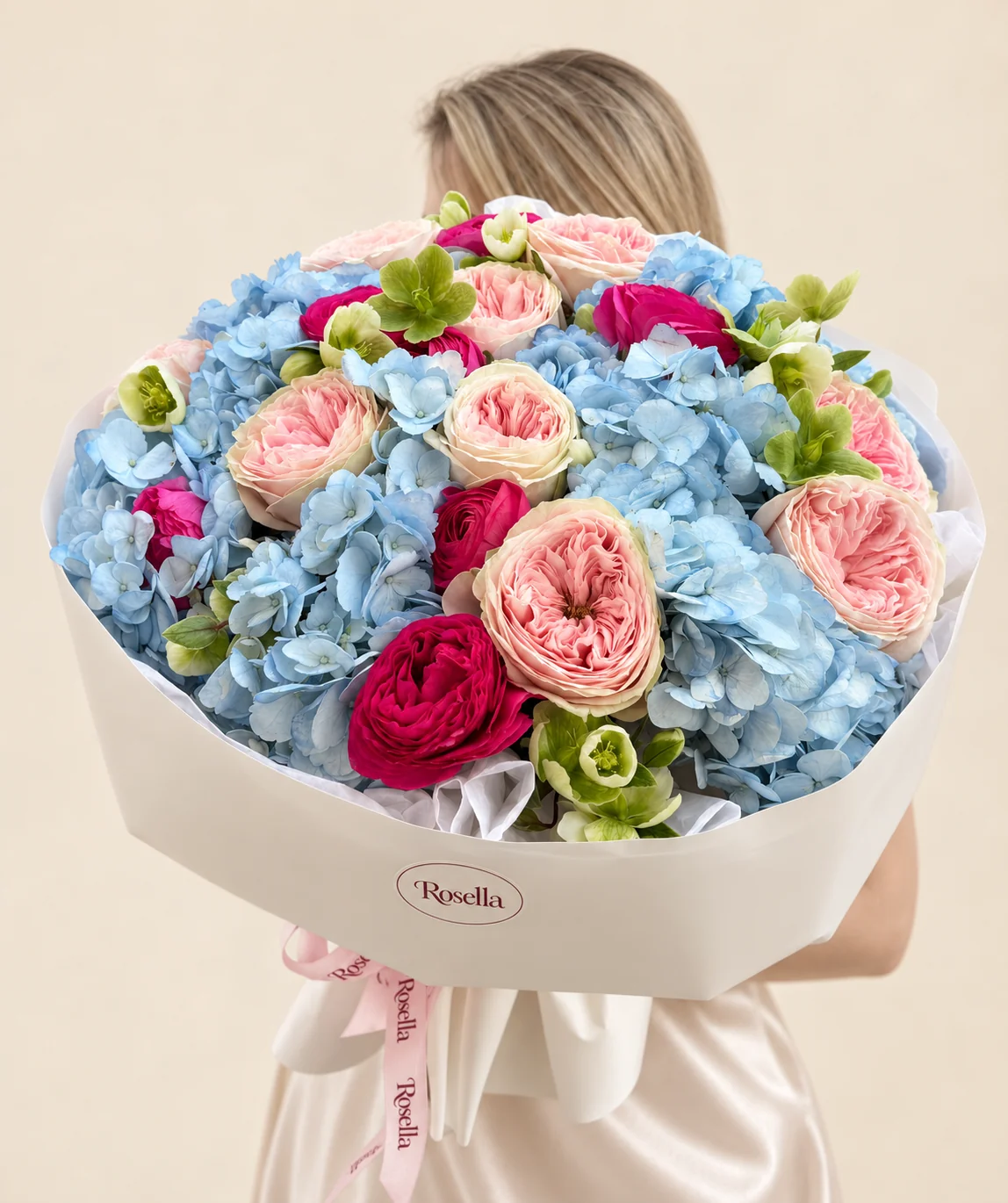 7 hydrangeas, 10 blush garden roses, 8 pink garden roses & 14 hellebore in a hand-tied bouquet