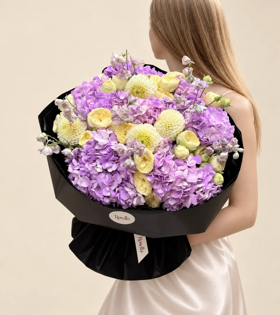10 hydrangeas, 22 garden roses, 5 dahlias & 3 delphiniums in a hand-tied bouquet