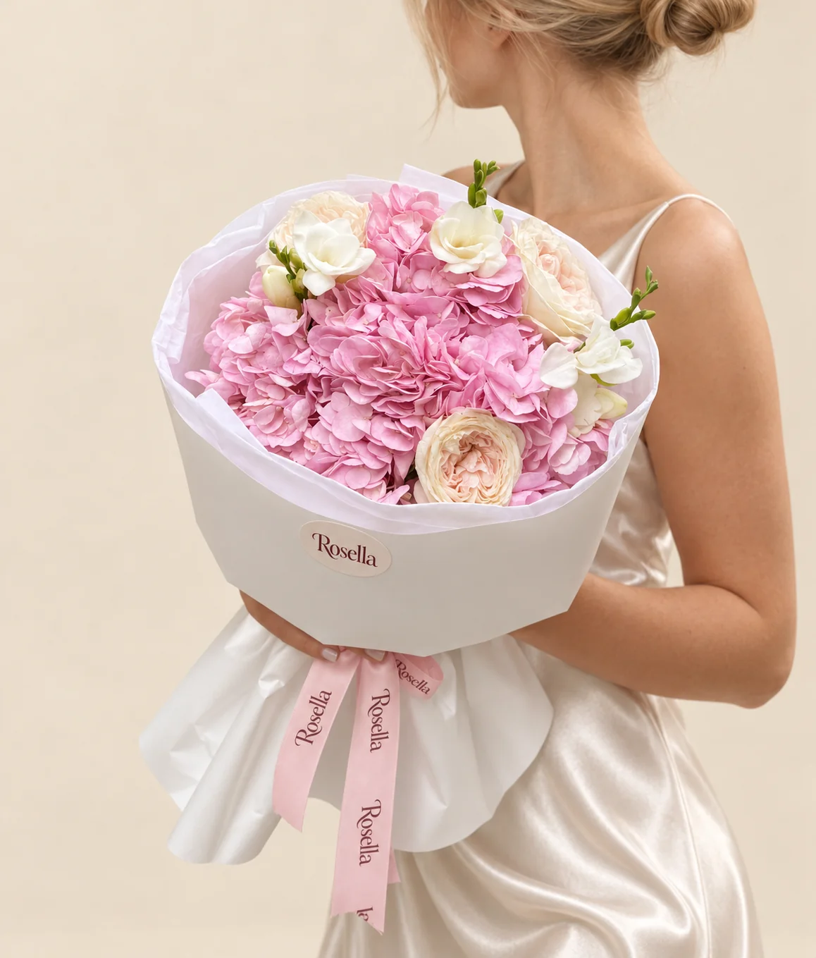 3 hydrangeas, 3 garden roses & 2 freesias in a hand-tied bouquet