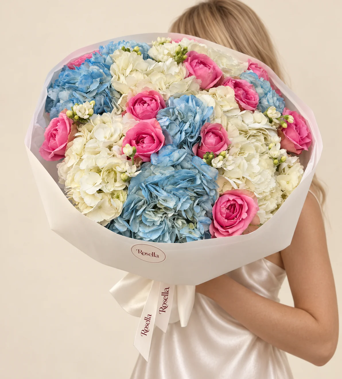 5 blue hydrangeas, 5 white hydrangeas, 12 garden roses & 22 tweedia blooms in a hand-tied bouquet